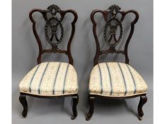 A pair of antique, upholstered nursing chairs