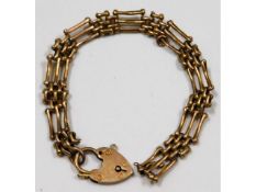 A 9ct gold three bar gate bracelet a/f 11.1g