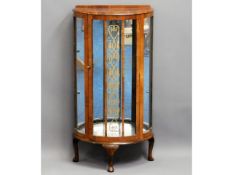 A mid 20thC. glass display cabinet, 45in high x 23