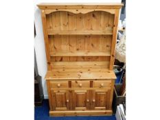A modern pine dresser, 79.5in high x 48in wide x 1