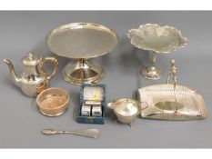 A silver plated cake stand twinned with other plat