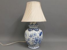 A large faience lamp with shade, 23.5in tall inc.