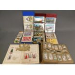 A quantity of post office postcards albums, tea ca