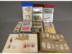 A quantity of post office postcards albums, tea ca