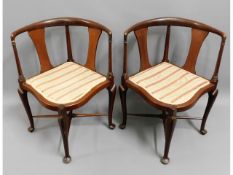 A pair of Edwardian arts & crafts style mahogany c