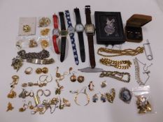 A quantity of costume jewellery including a silver