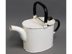 A Christopher Dresser style enamelled watering can