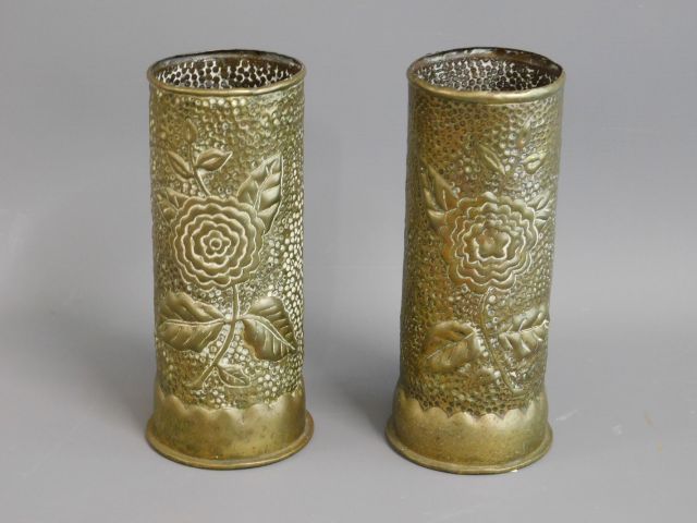 A pair of trench art style brass shells, 8in tall