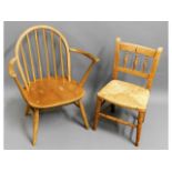 A child's Ercol chair & one other rush seated chair