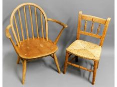 A child's Ercol chair & one other rush seated chair