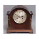 A wooden mantle clock, 11.5in high