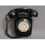 A retro wall mounted telephone