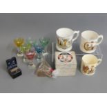 Six coloured shot glasses, one with small chip, a