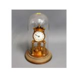 A mid 20thC. glass domed anniversary style clock,