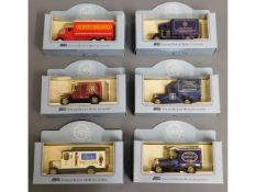 A set of six boxed Lledo diecast model vehicles in