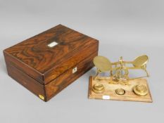 A decorative rosewood box with MOP insert twinned