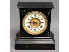 An iron mantle clock, rear door a/f 10in high