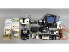 A quantity of mixed cameras & related items twinne