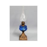 A Bristol blue style antique oil lamp, 21in tall