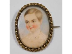 A 19thC. closed back yellow metal brooch with wate