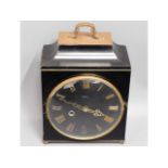 A Smiths wooden mantle clock with black dial, 10.5