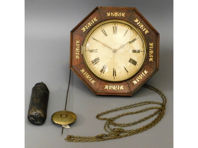 An early 19thC. inlaid wall clock with pendulum &