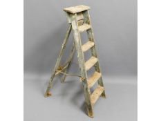 A wooden step ladder, 46in high
