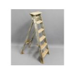 A wooden step ladder, 46in high