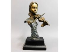 A stylised figurative bronze violin player on plin