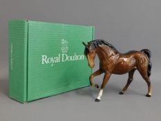 A Royal Doulton race horse, 7.25in tall