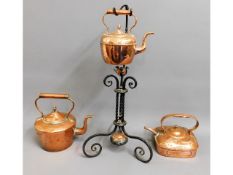 A Georgian copper kettle, one other with stand & a