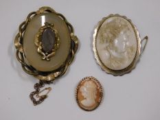 A small 9ct gold mounted cameo, a silver mounted c