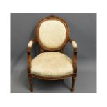 A walnut upholstered chair