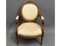 A walnut upholstered chair