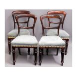 A set of four 19thC. mahogany balloon backed chair