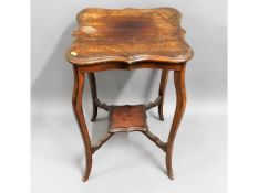 An Edwardian occasional table 27in high x 18in wid