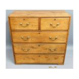 A 19thC. two piece oak military campaign chest wit