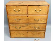 A 19thC. two piece oak military campaign chest wit