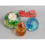 A Wedgwood paperweight, two other paperweights & a