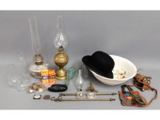 A quantity of mixed items including oil lamps, was