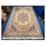 A large woollen rug, approx 12ft x 9ft