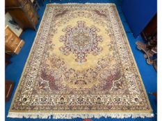 A large woollen rug, approx 12ft x 9ft