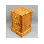 A pine chest of three drawers, 25.25in high