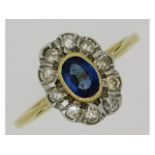 A 9ct gold sapphire & diamond ring, set with appro