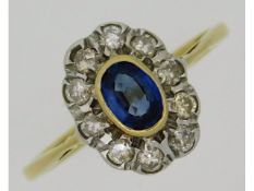 A 9ct gold sapphire & diamond ring, set with appro