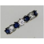 A ladies 9ct white gold half eternity ring set with approx. 0.45ct diamond & sapphire, 2.7g, size N/