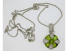 A 9ct gold white gold necklace & pendant set with