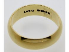 A 9ct gold band, 3.7g, size N/O