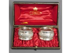 A cased pair of 1918 Birmingham silver napkin ring