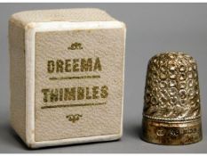 A boxed 1929 Birmingham silver thimble by James Fe